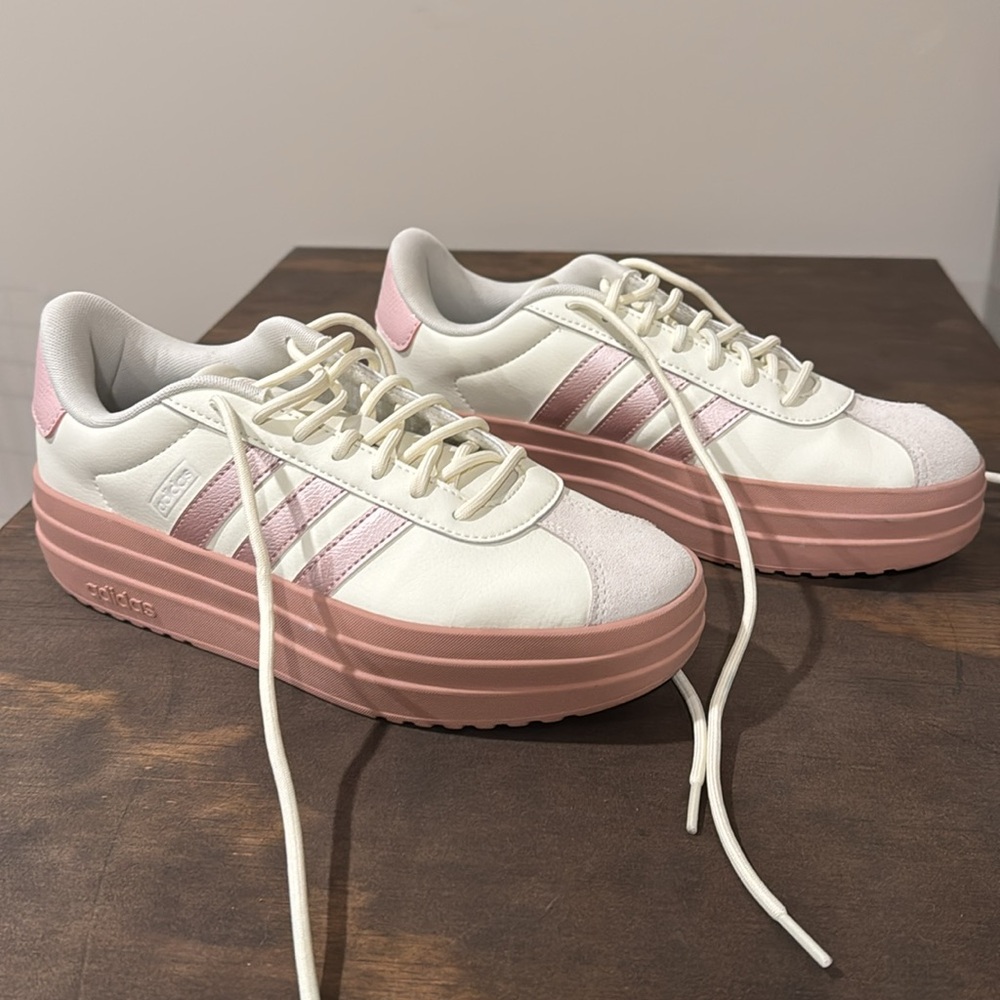 Size 8.5 Women’s Adidas fashion sneakers. Excellent condition- only worn once.